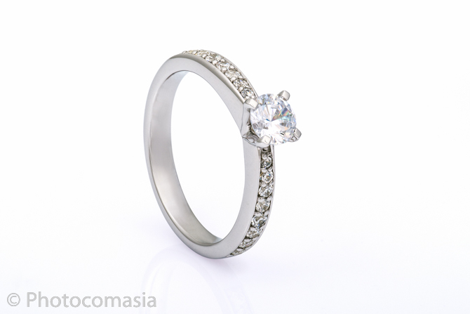 Gold ring with diamonds Gold ring with diamonds On the white background